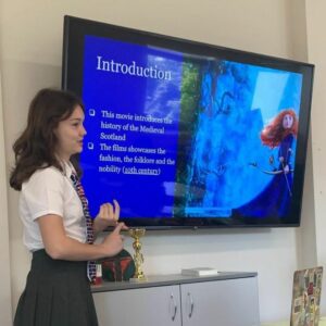An MYP student presenting an analysis of a traditional narrative which has been modernised and turned into a blockbuster animated movie.